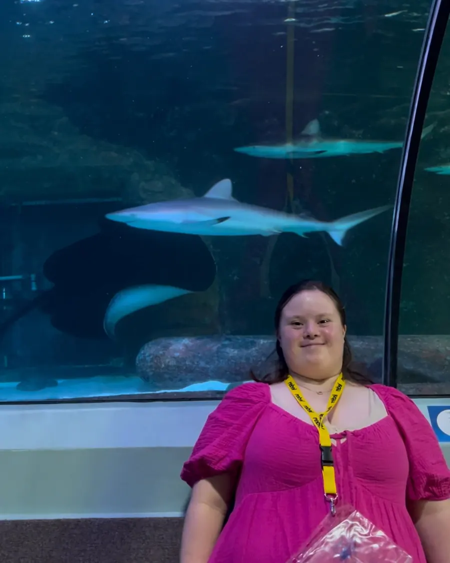 Young people with EDS support workers at an aquarium
